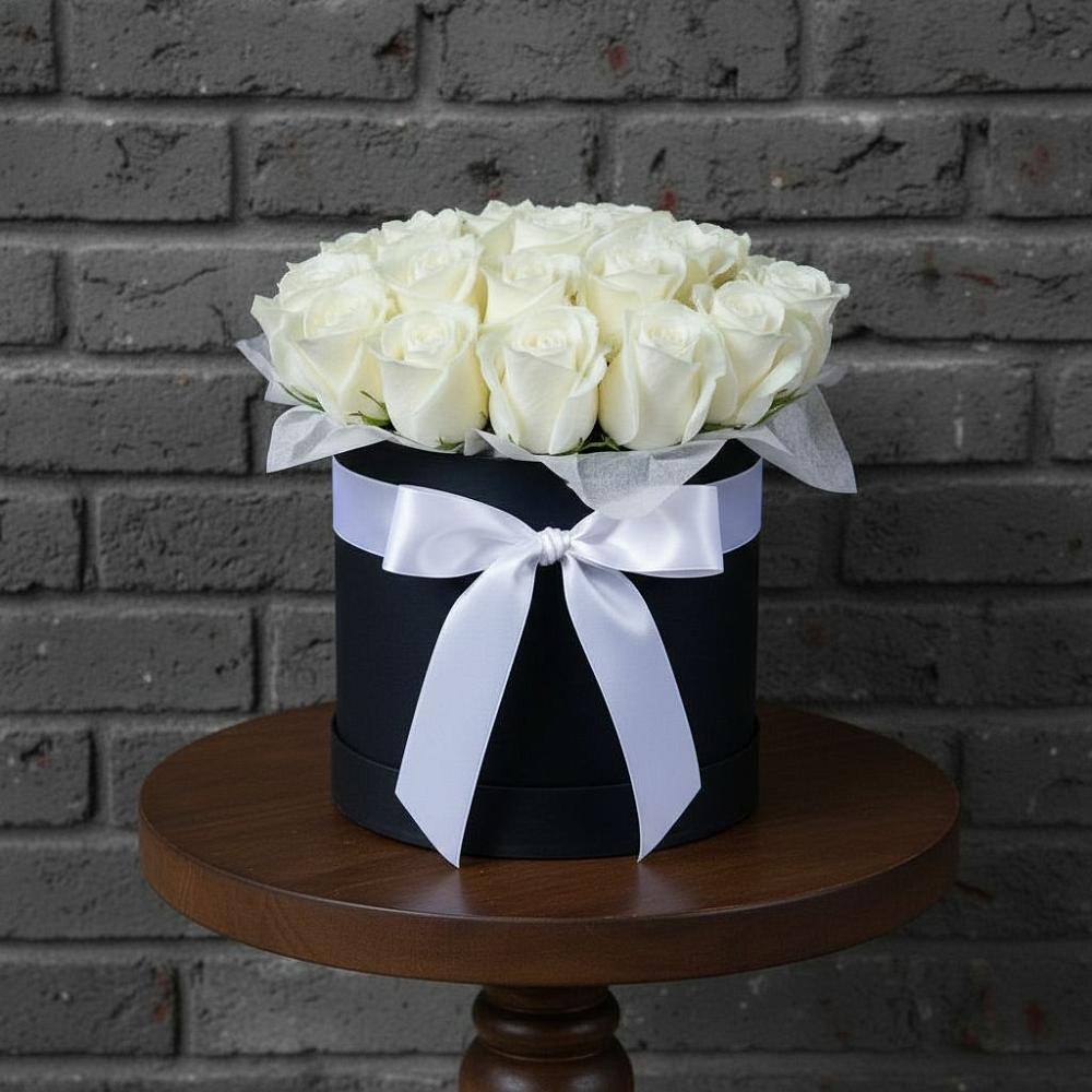 Цветочная композиция из Розы в шляпной коробке в Чебаркуле